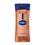 روغن بدن ژله ای شاین دار (شیمر) وازلین رنگ طلایی شامپاینی Vaseline Glazed and Glisten Sunlit Glow Body Gel Oil رایحه Vanilla cocoa حجم 200 میل